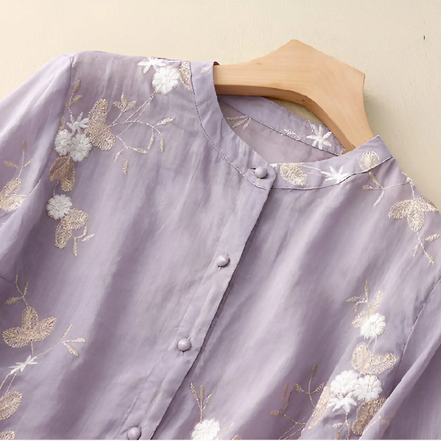 Women’s Long-Sleeved Blouse with Embroidery and Tiered Hem