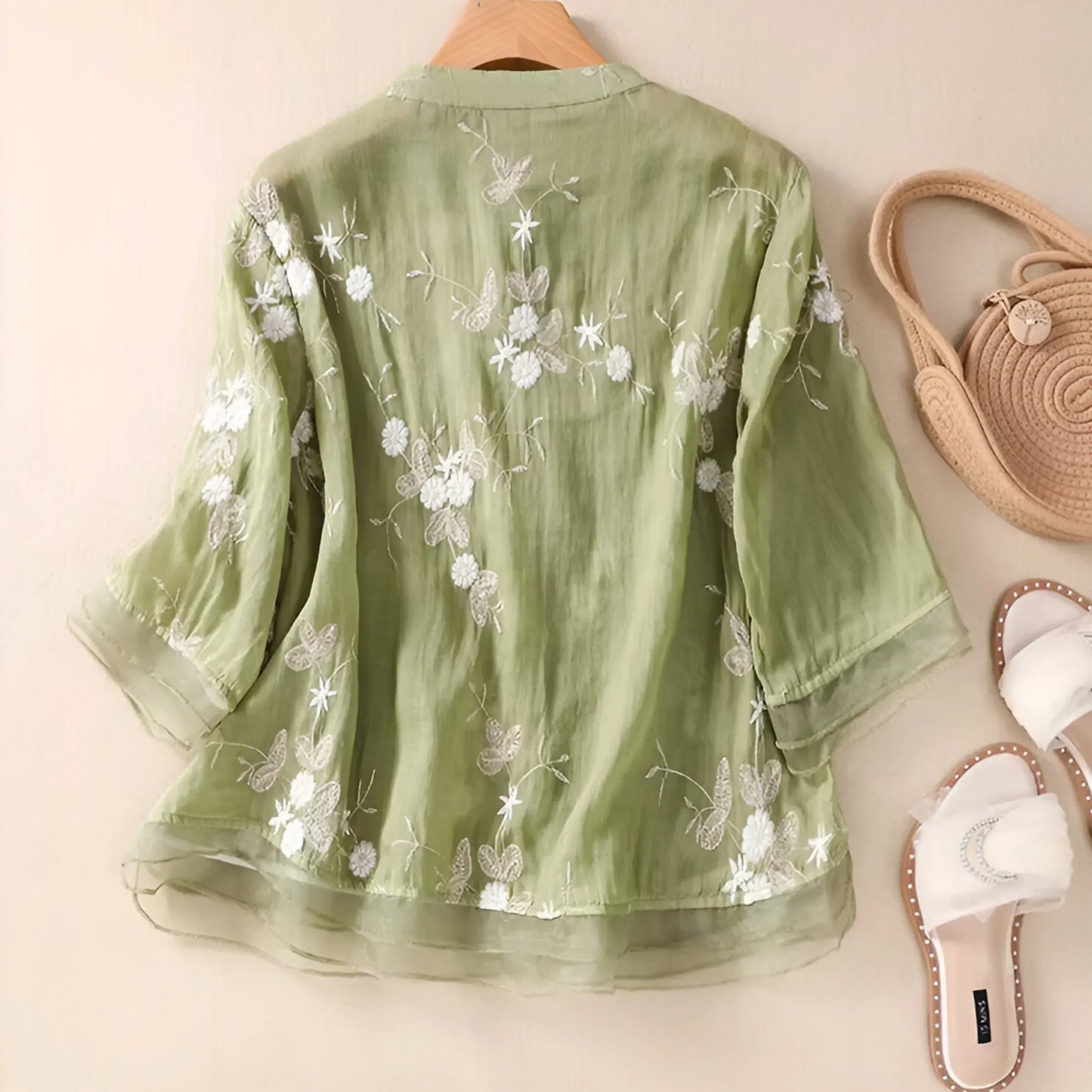 Women’s Long-Sleeved Blouse with Embroidery and Tiered Hem