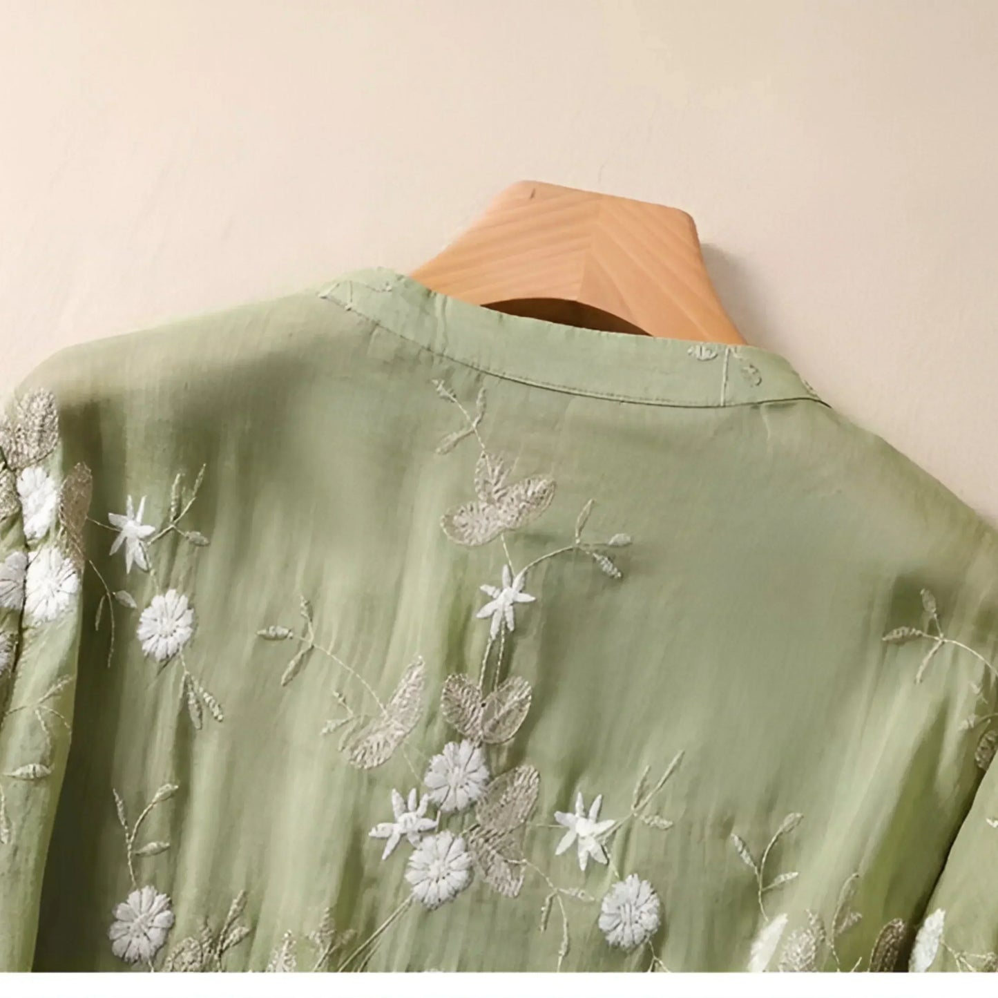 Women’s Long-Sleeved Blouse with Embroidery and Tiered Hem
