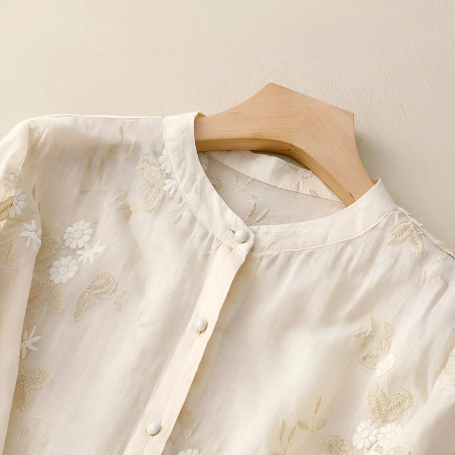 Women’s Long-Sleeved Blouse with Embroidery and Tiered Hem
